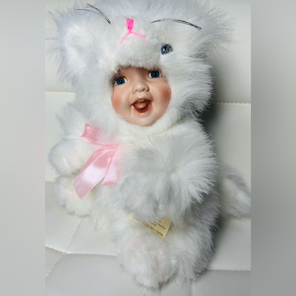 Show-Stoppers Fluffy from the Babes In The Wild Series Porcelain Head Plush Doll